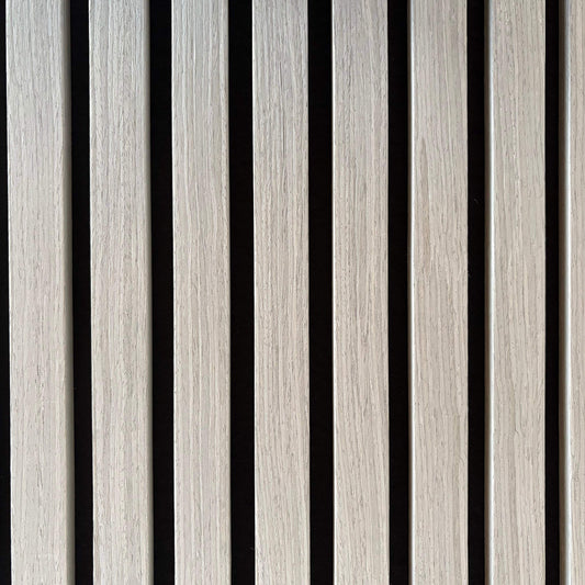 Extreme close-up of Vantaa Grey wood slats, emphasizing natural grain, precise craftsmanship, and sleek gray finish on black background.