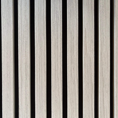 Extreme close-up of Vantaa Grey wood slats, emphasizing natural grain, precise craftsmanship, and sleek gray finish on black background.