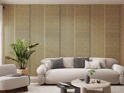 Cozy living room with Vantaa acoustic panels (60x60 cm) in warm wood slats on the wall, next to a light gray curved sofa, potted plant, coffee table, and armchair.